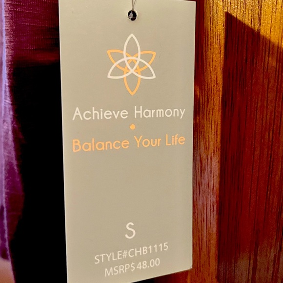 Small Purple top, cross cross in the back with ruching on the bottom sides. - Picture 3 of 3